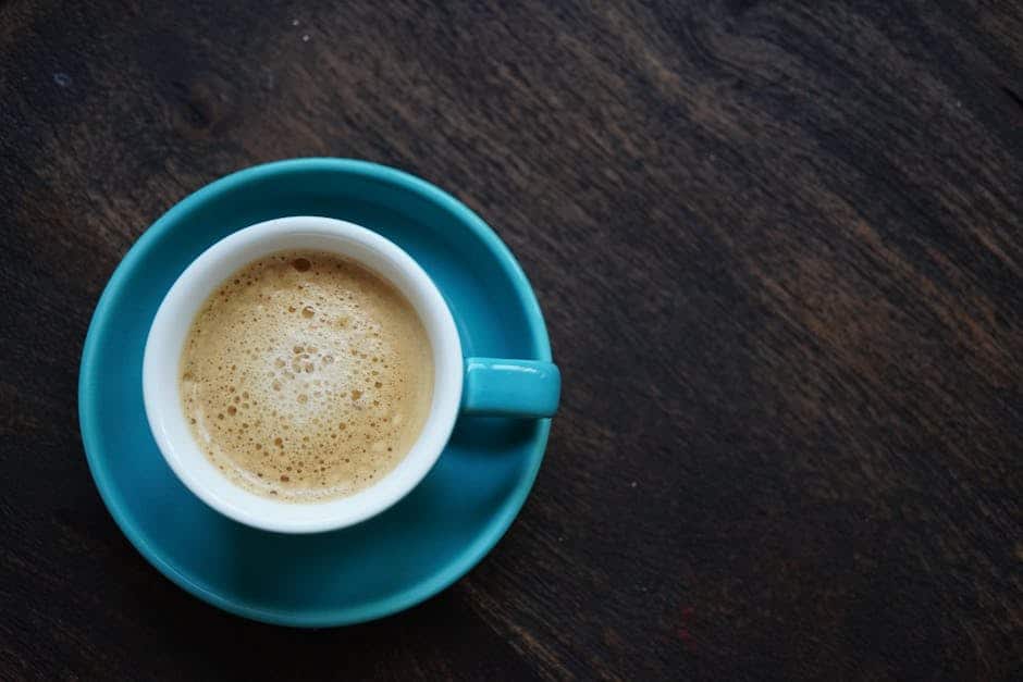 A close-up of an espresso shot, highlighting the rich crema and the complex flavor profile beneath